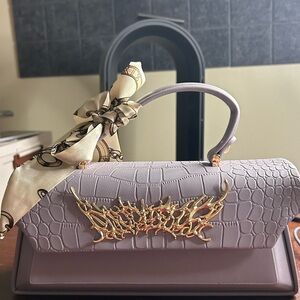 Purple and Gold Structured Satchel with Embossed Texture